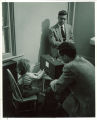 Conducting research with a young girl, The University of Iowa, 1950s