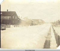 South side of main street in winter, Amana, Iowa, 1900s