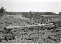 1995  Construction of Ditch Crossing with bulldozer and pipe.