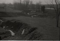 Stream running down eroded area
