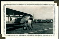 0049_Earl Pohlmann in Front of Plane, 1942