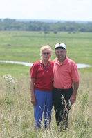 Unidentified couple in pasture land