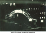 Illuminated archway, Homecoming, The University of Iowa, 1920s
