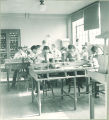 Dental students working in lab, The University of Iowa, 1930s