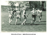 Students playing a game outside, The University of Iowa, April 30, 1938