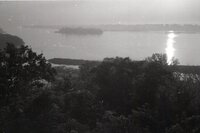 Barges being towed on river