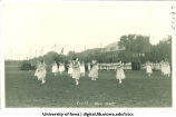 Women dancing for celebration on Iowa Field, The University of Iowa, June 1, 1917