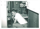 Physics student and scientific equipment, The University of Iowa, May 1962