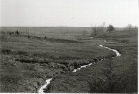 Stream running down eroded area