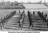 Cadets bayonet training among four ranks, Iowa Field, The University of Iowa, 1919