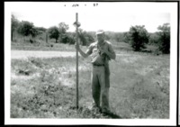 Man Surveys Farmland 