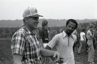 1978  William Baugh talks with John Wagenbach and other farmers in field during no-till corn field tour