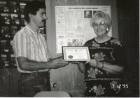Mike Lewitke Presents Retirement Certificate to Dorothy Davis