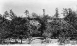 Opposite points where the road enters the valley on the west side of "Backbone," Iowa, late 1890s or early 1900s