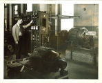 Engineering student working with high voltage equipment in a laboratory, The University of Iowa, 1939