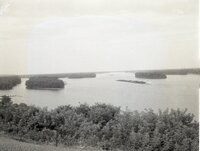 Barges being towed on river