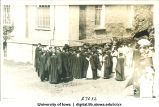 Gathering of graduates next to Old Capitol on Class Day, The University of Iowa, 1920s