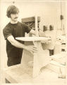 Art student creating a wood sculpture, The University of Iowa, 1970