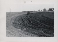 Plowing a field.