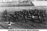 Military company physical exercise on Iowa Field, The University of Iowa, 1919