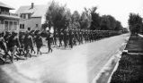 Army detachment and convoy fo military transport trucks, 1918