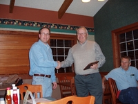 2004  Gary Wagner Memorial Land Stewardship award winner Wayne Corman receives his plaque from Chairperson Todd Heckenberg 
