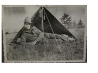 Soldier Resting in Front of Tent