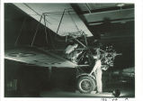 Engineering students working on airplane, The University of Iowa, August 1941