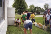 1999 Measurement being taken for tree planting placement by students at West Burlington High School
