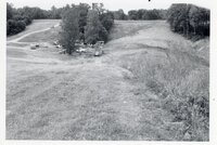1970's Grassy field with machinery