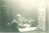 Carl Menzer in WHAA radio station, The University of Iowa, March 1924