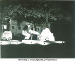 Homecoming decorations in front of Phi Kappa Psi fraternity house, The University of Iowa, 1940s